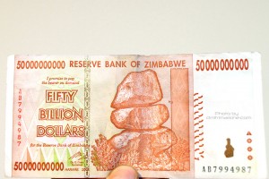 In case you've never seen it, here's $50 BILLION dollars from Zimbabwe.   You'd think you can buy a country with it,yet this is barely enough to buy an egg...